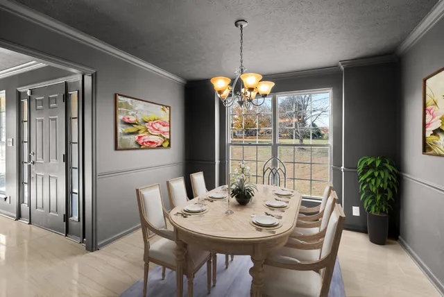 a kitchen with stainless steel appliances granite countertop a stove microwave and sink