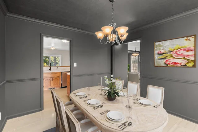 a kitchen with sink a microwave and stove