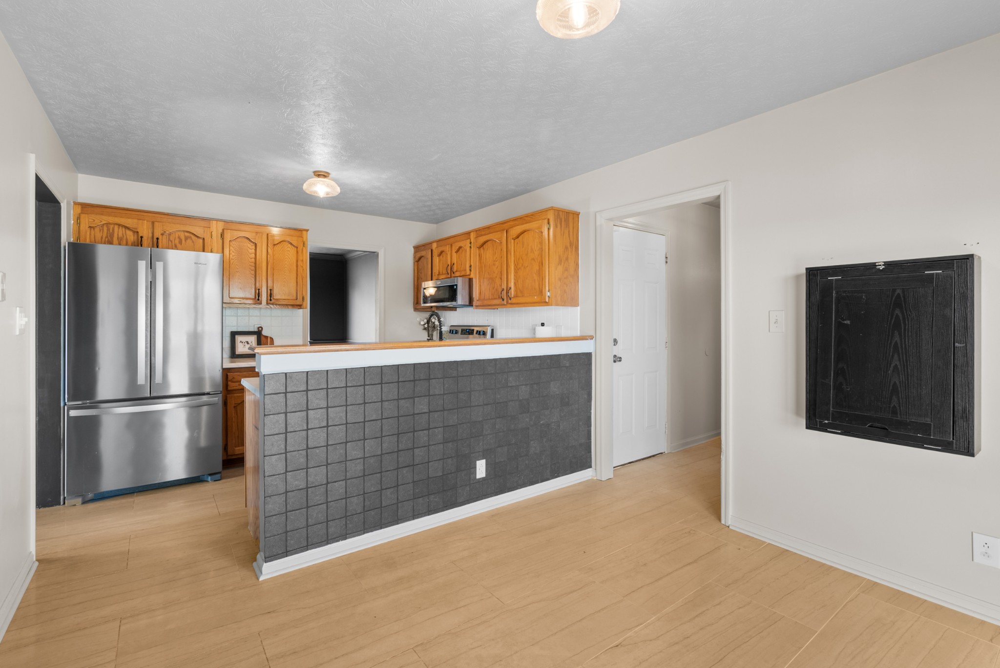 2867 Jack Teasley Road Pleasant View, TN 37146 - Photo 21 of 61 a kitchen with stainless steel appliances a refrigerator sink and microwave