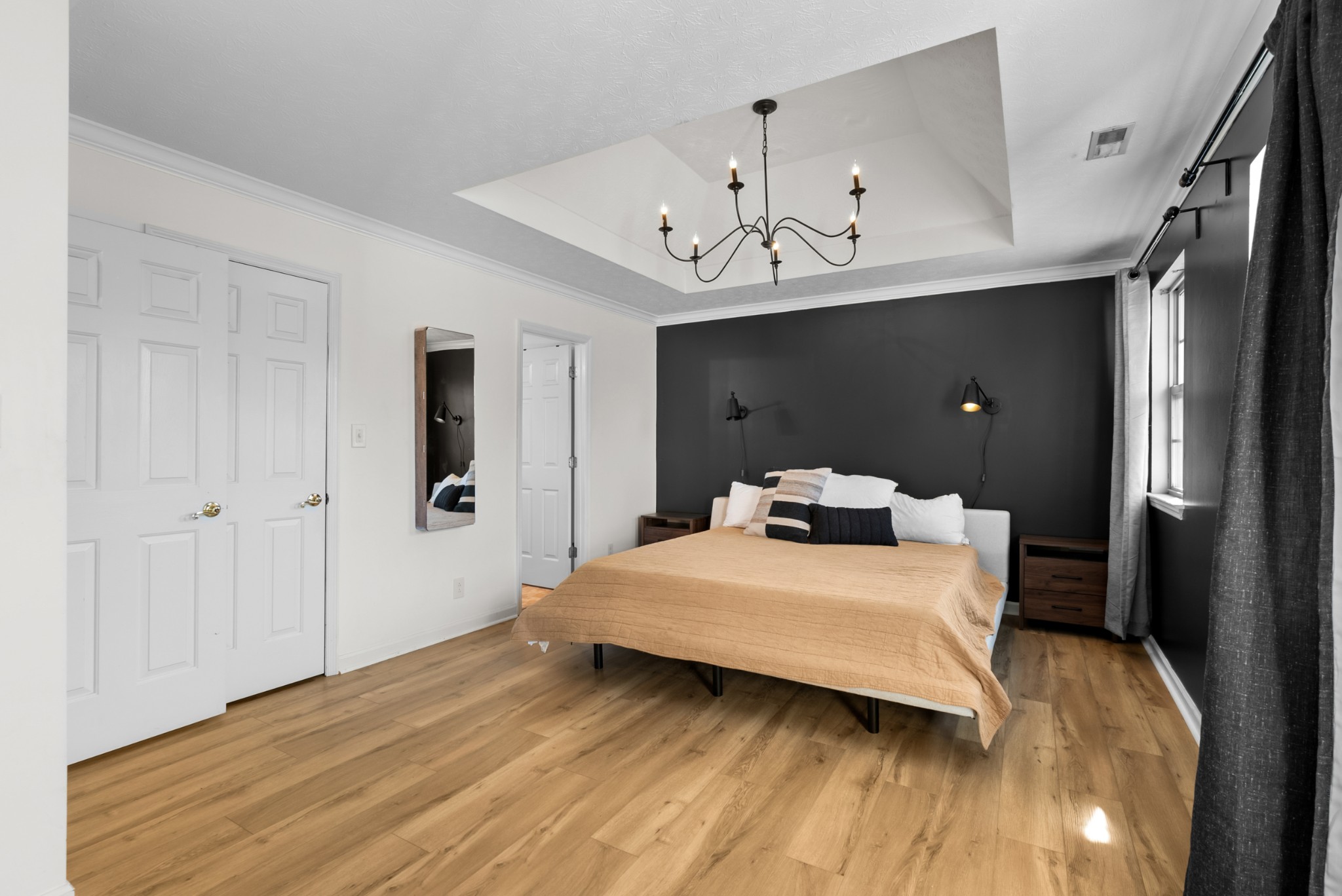 2867 Jack Teasley Road Pleasant View, TN 37146 - Photo 29 of 61 a bedroom with a bed and wooden floor