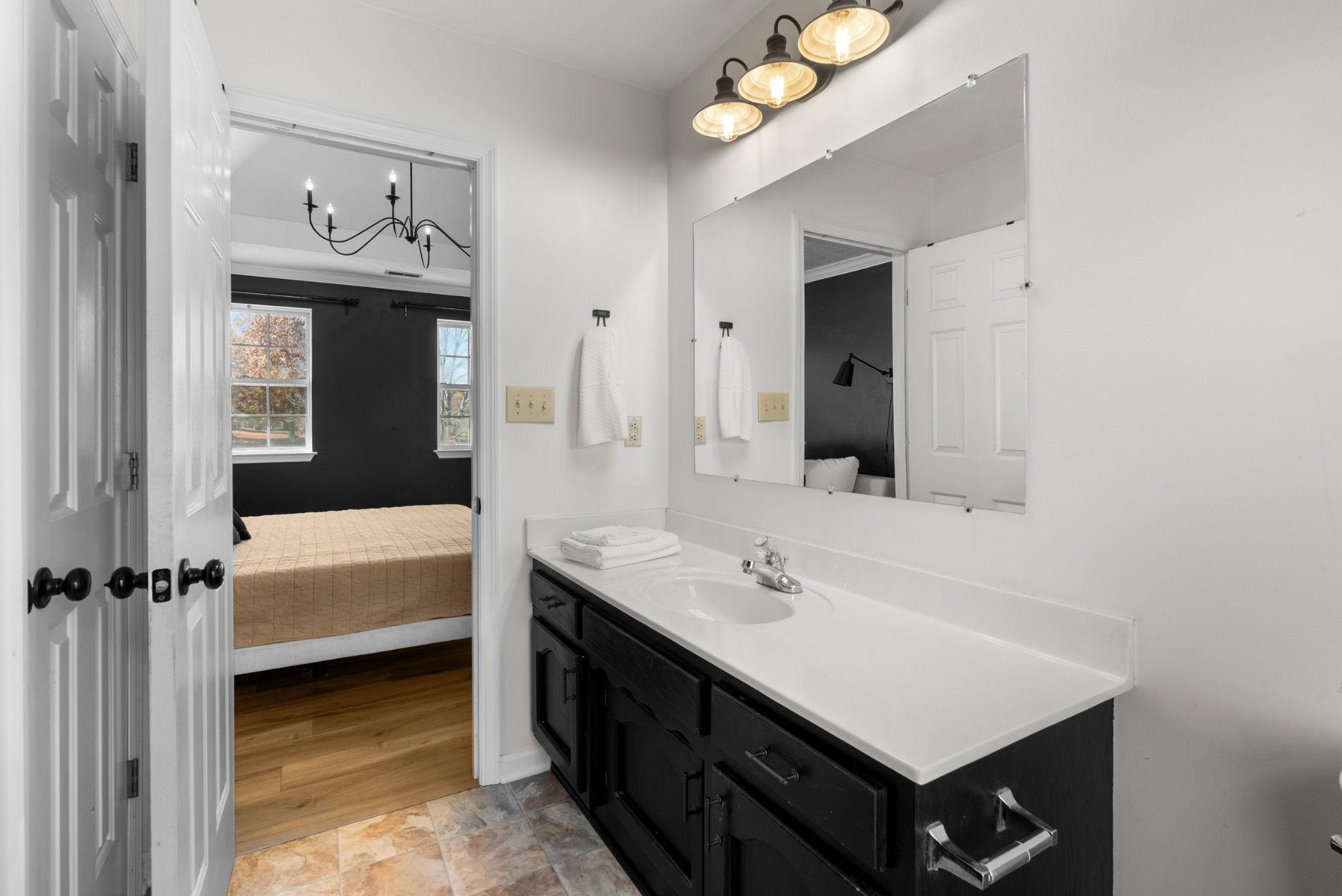 2867 Jack Teasley Road Pleasant View, TN 37146 - Photo 34 of 61 a en suite bathroom with a sink double vanity and a mirror