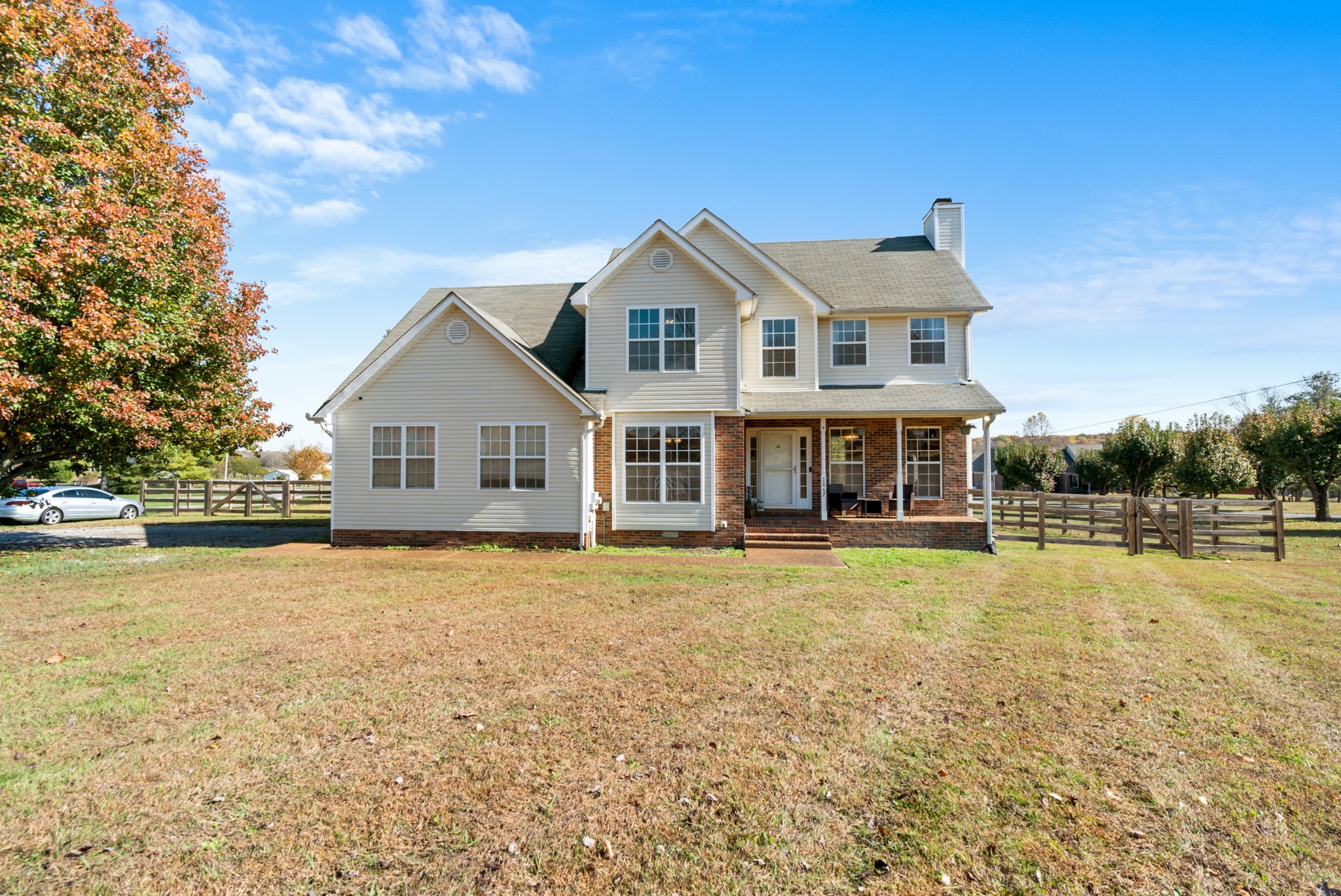 2867 Jack Teasley Road Pleasant View, TN 37146 - Photo 4 of 61 a front view of a house with a yard