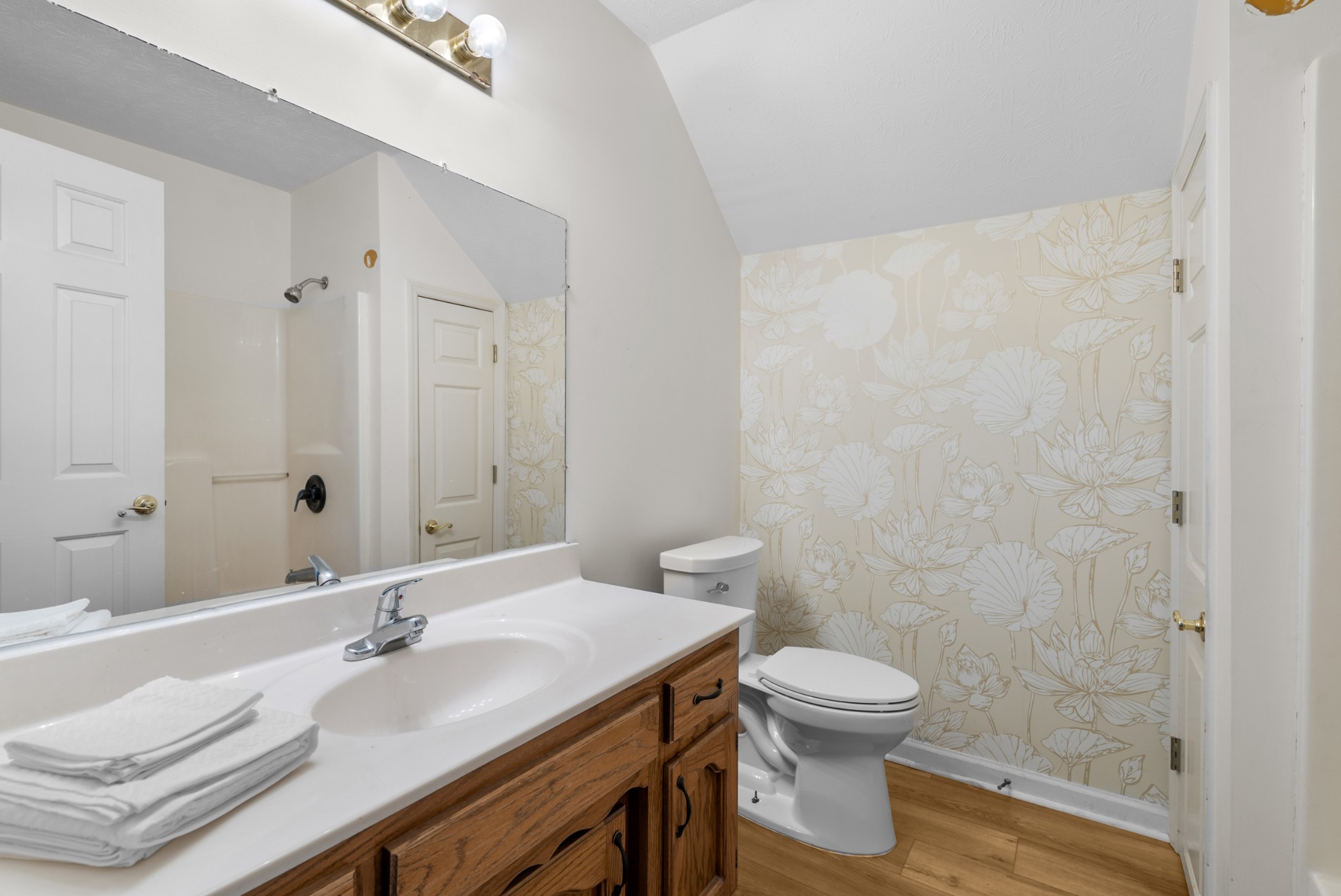 2867 Jack Teasley Road Pleasant View, TN 37146 - Photo 41 of 61 a bathroom with a granite countertop sink a toilet and a mirror