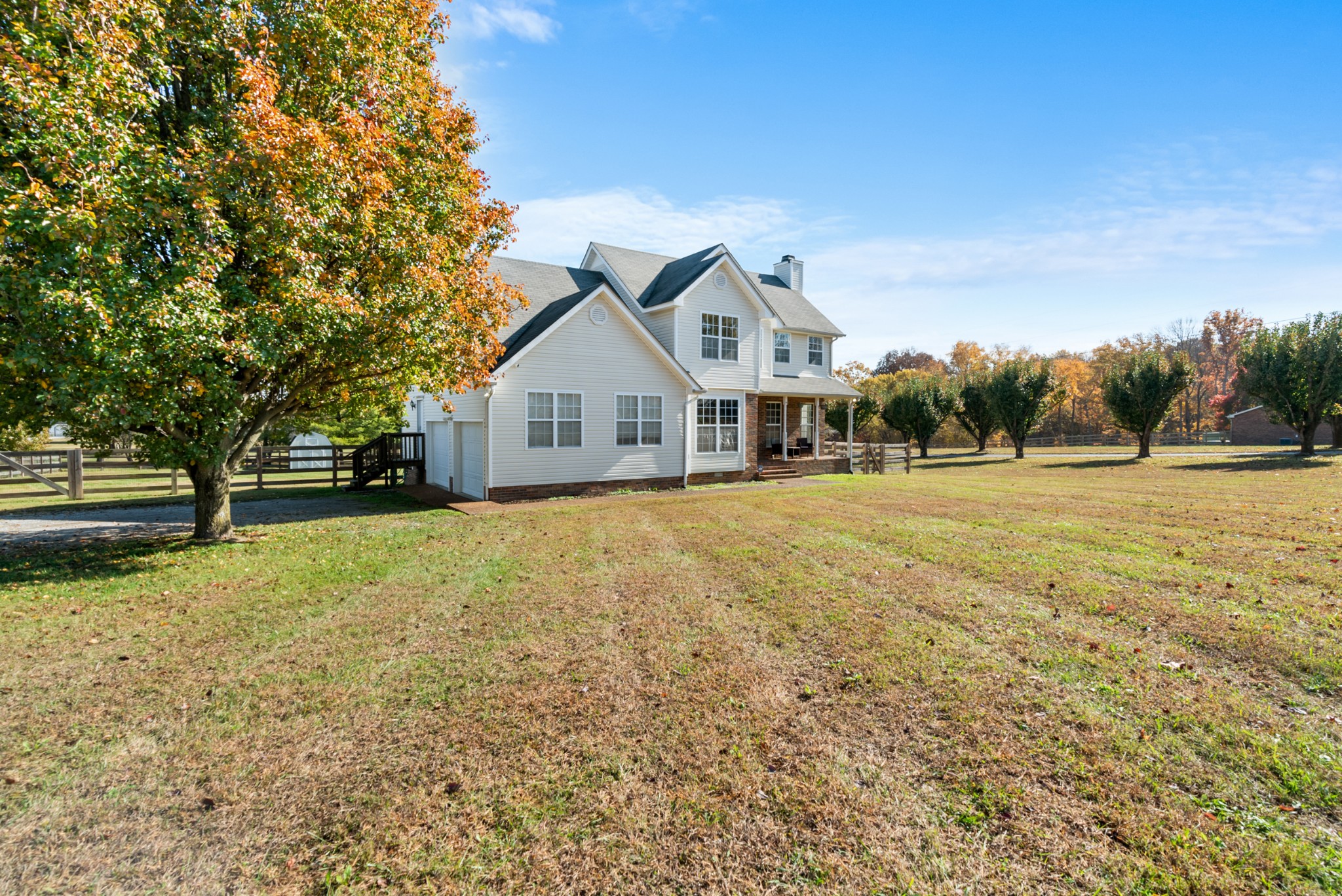 2867 Jack Teasley Road Pleasant View, TN 37146 - Photo 6 of 61 a front view of a house with a yard and trees