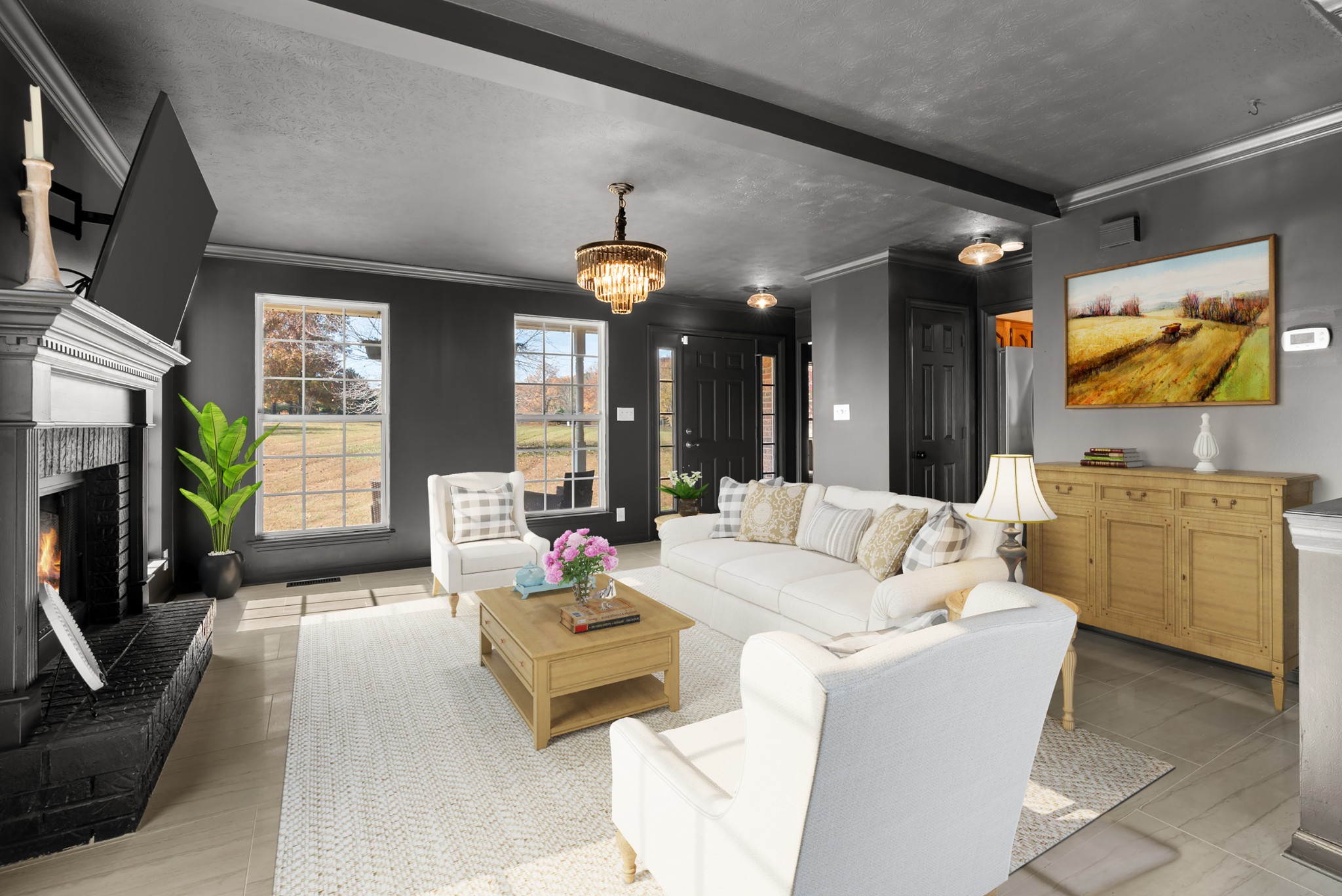 2867 Jack Teasley Road Pleasant View, TN 37146 - Photo 9 of 61 a living room with furniture a flat screen tv and a fireplace