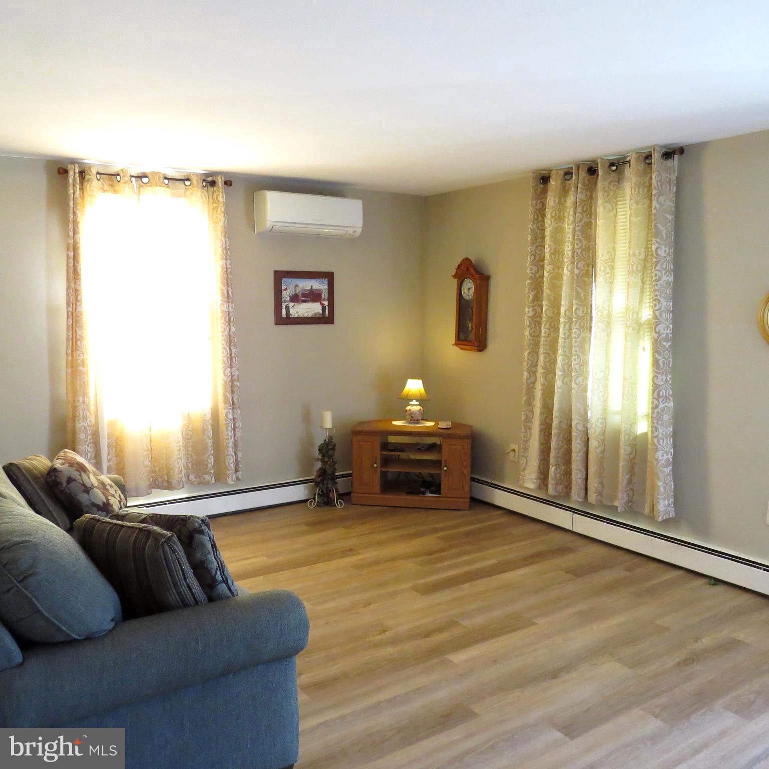4930 Ridge Road Rosedale, MD 21237 - Photo 2 of 49 a living room with furniture and a window