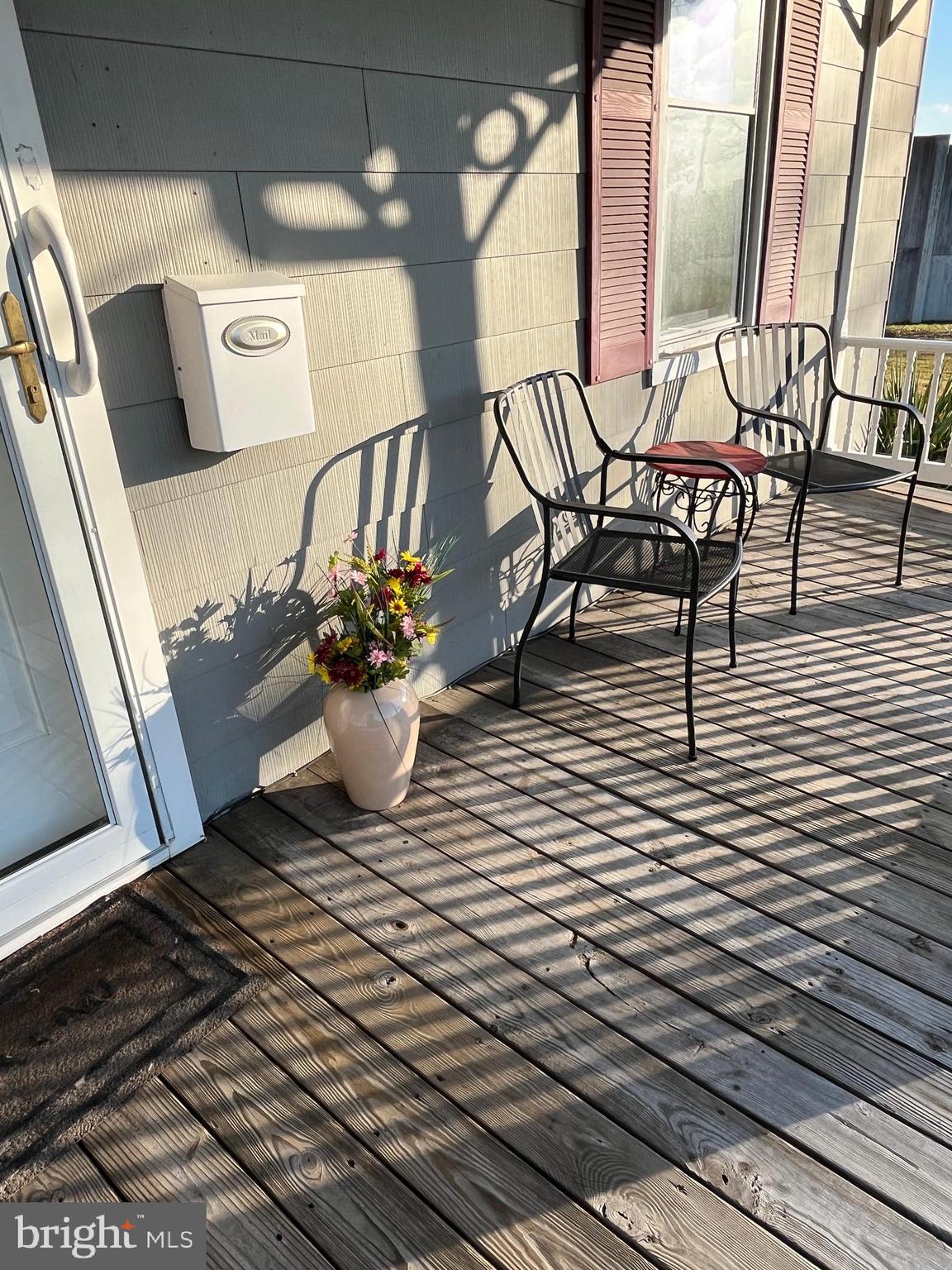 4930 Ridge Road Rosedale, MD 21237 - Photo 36 of 49 a view of a chairs and table on the balcony
