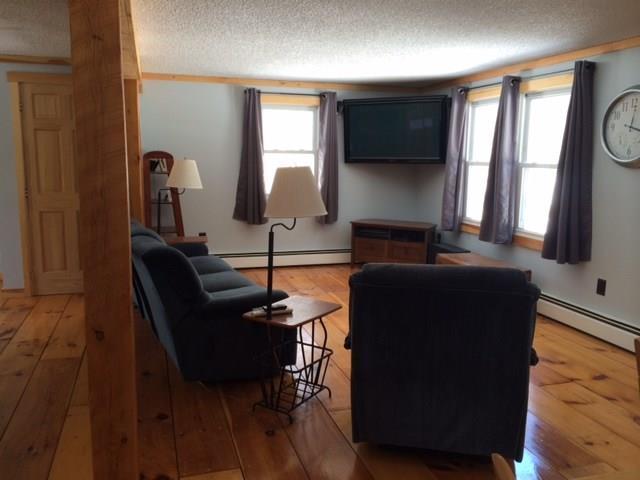 182 Peter Vier Road Durham, ME 04222 - Photo 8 of 19 Another view of the living room,...