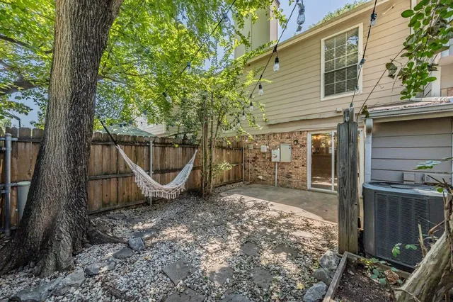 a backyard of a house with lots of green space