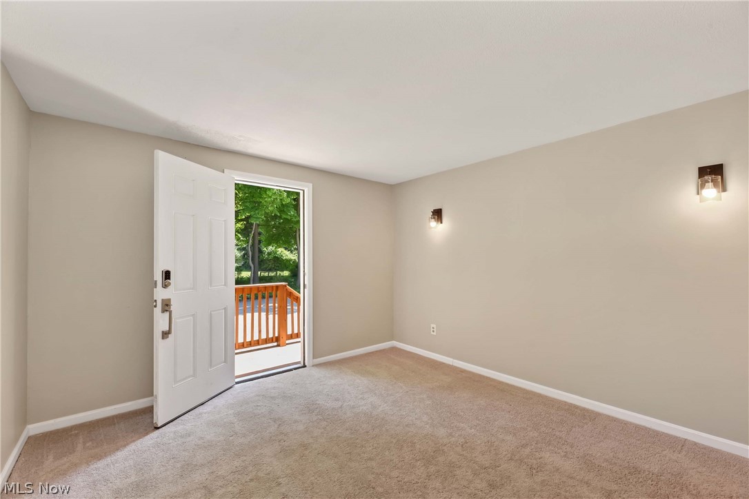 29514 Ridge Road Wickliffe, OH 44092 - Photo 33 of 49 View of carpeted primary bedroom