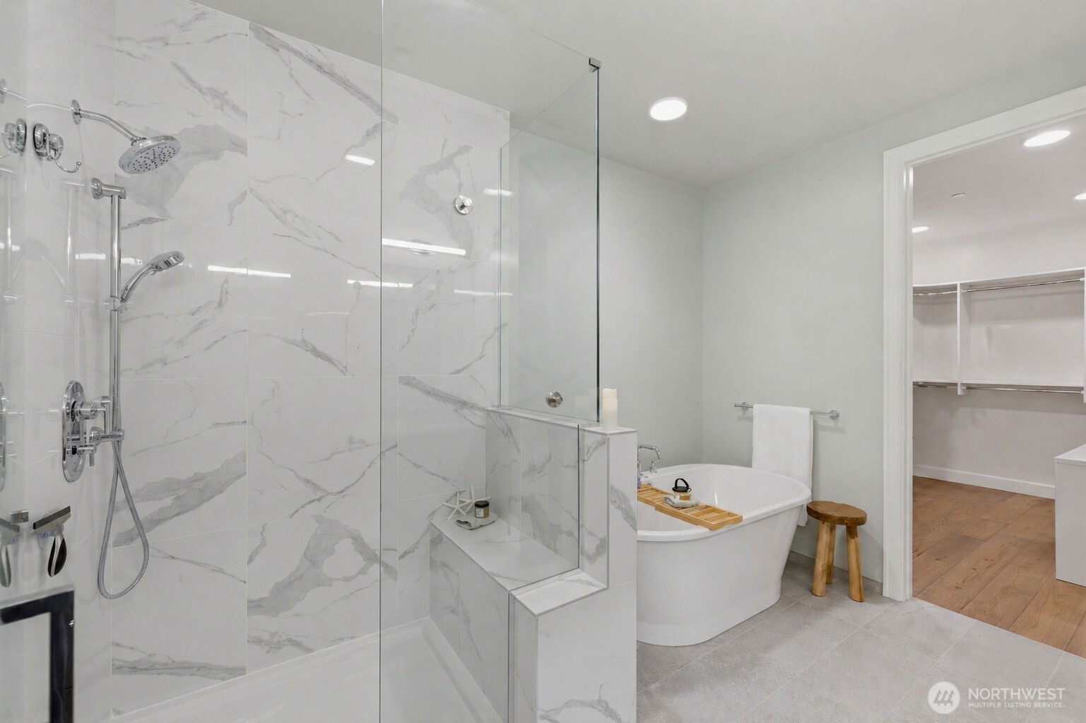 4907 Main Street, Unit 102 Tacoma, WA 98407 - Photo 15 of 34 a view of a bathroom with a tub shower and a sink