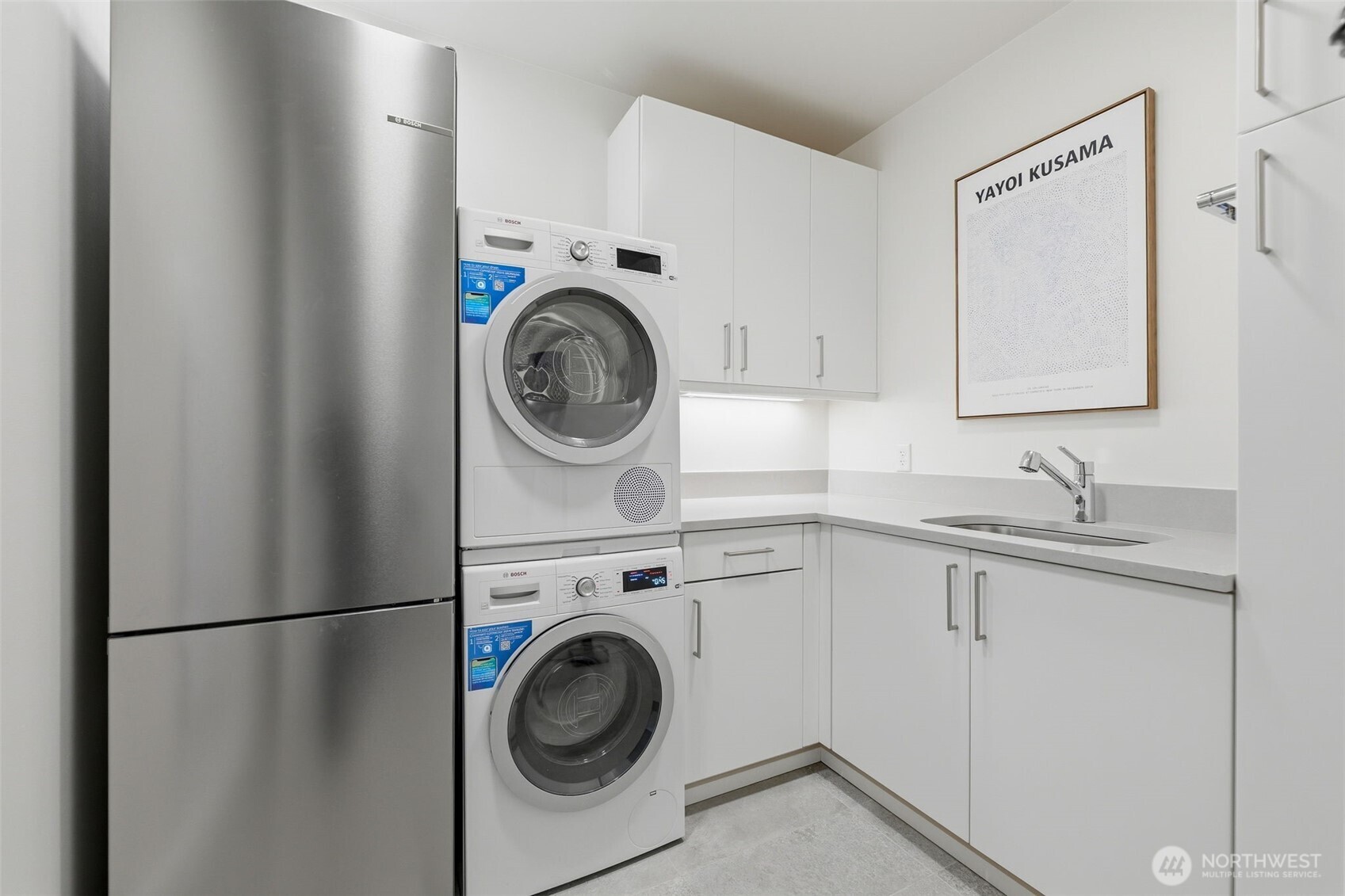 4907 Main Street, Unit 102 Tacoma, WA 98407 - Photo 21 of 34 a utility room with sink dryer and washer