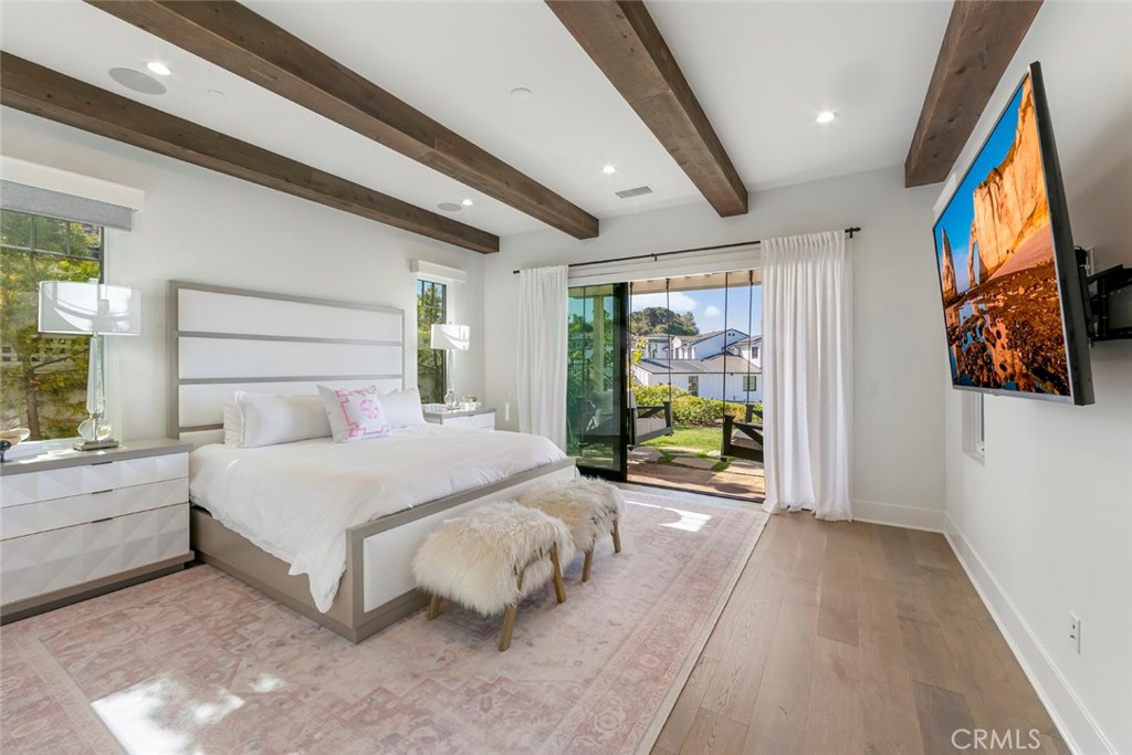 5 Rancho Elastico Road Rolling Hills Estates, CA 90274 - Photo 20 of 48 a bedroom with a bed and a couch