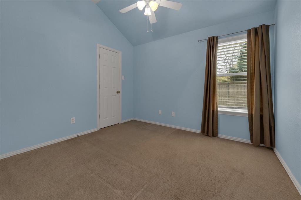 910 Derby Court Celina, TX 75009 - Photo 21 of 27 a view of an empty room with a window