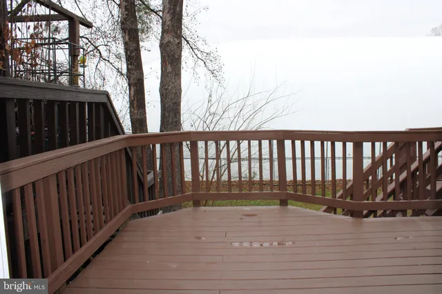 a balcony with wooden floor