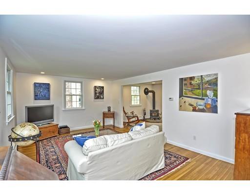 32 Tall Tree Road Sharon, MA 02067 - Photo 13 of 29 a living room with furniture and a flat screen tv