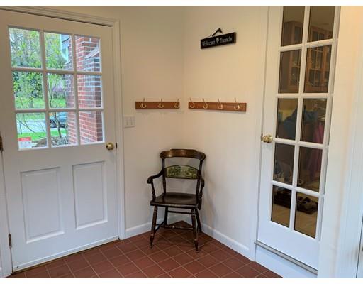 32 Tall Tree Road Sharon, MA 02067 - Photo 25 of 29 a bench sitting in front of a door