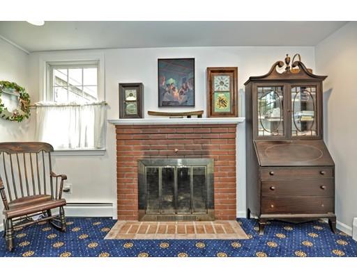 32 Tall Tree Road Sharon, MA 02067 - Photo 10 of 29 a living room with furniture and a fireplace