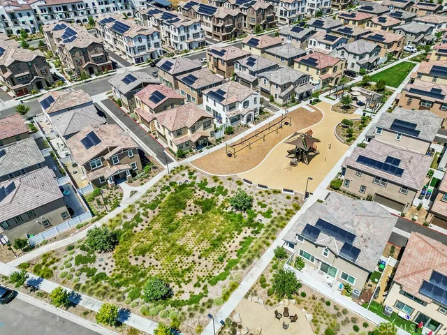 a view of a house with a park