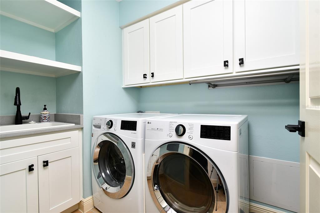 3321 Sunset Key Circle, Unit 408 Punta Gorda, FL 33955 - Photo 12 of 42 a utility room with dryer and washer