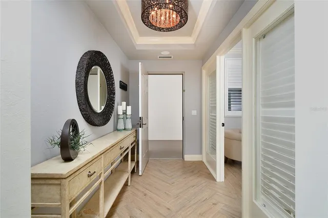 a bathroom with a sink a mirror and a shower