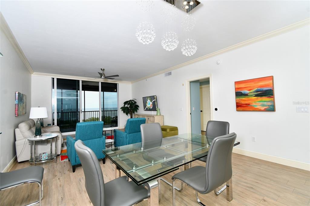 3321 Sunset Key Circle, Unit 408 Punta Gorda, FL 33955 - Photo 17 of 42 a living room with furniture and a large window