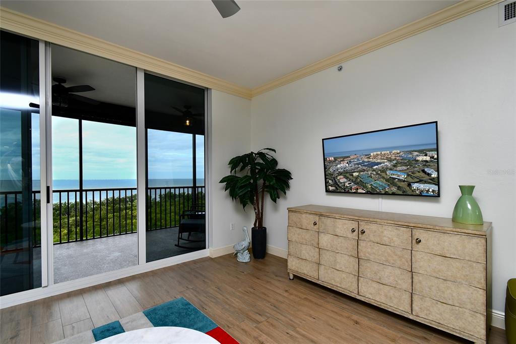 3321 Sunset Key Circle, Unit 408 Punta Gorda, FL 33955 - Photo 19 of 42 a view of livingroom with furniture wooden floor and window