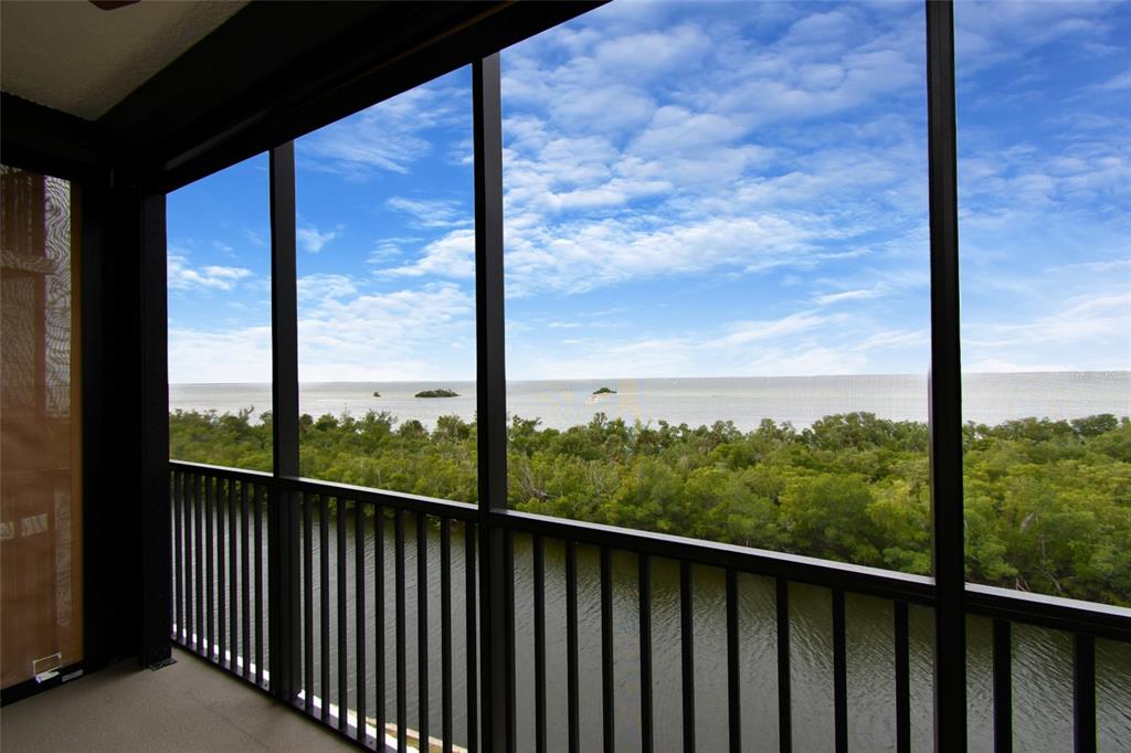3321 Sunset Key Circle, Unit 408 Punta Gorda, FL 33955 - Photo 21 of 42 a view of a balcony with wooden floor