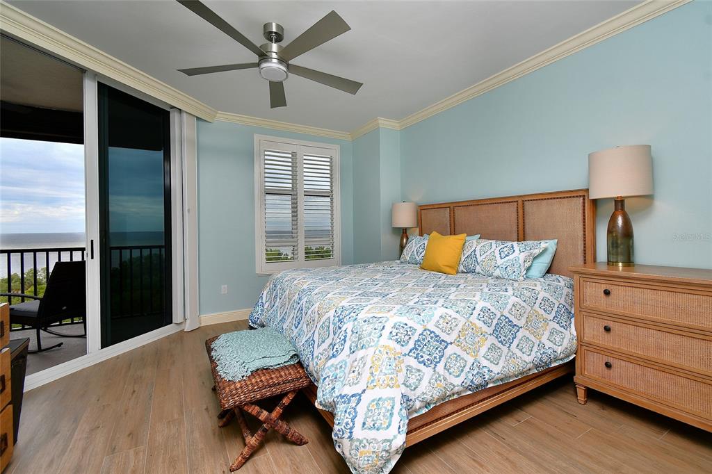 3321 Sunset Key Circle, Unit 408 Punta Gorda, FL 33955 - Photo 23 of 42 a bedroom with a bed and a window