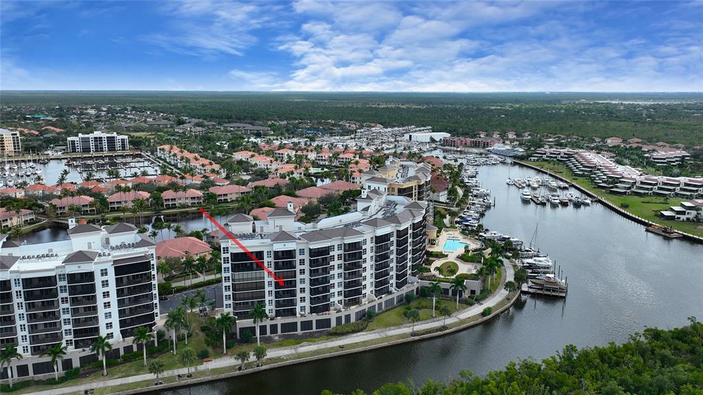 3321 Sunset Key Circle, Unit 408 Punta Gorda, FL 33955 - Photo 3 of 42 a view of a lake with a city view