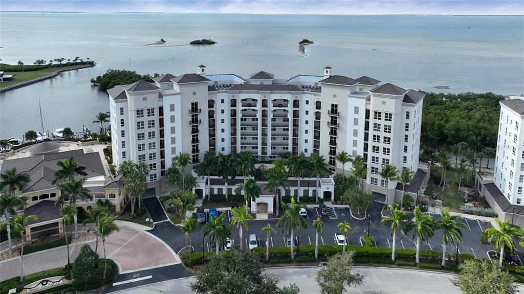 3321 Sunset Key Circle, Unit 408 Punta Gorda, FL 33955 - Photo 38 of 42 an aerial view of multiple houses with a yard