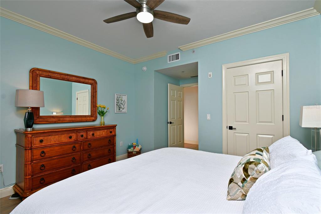 3321 Sunset Key Circle, Unit 408 Punta Gorda, FL 33955 - Photo 10 of 42 a bedroom with a bed and a dresser