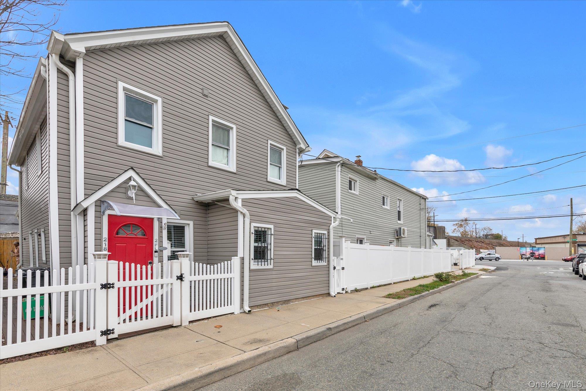 218-12 141st Road Queens, NY 11413 - Photo 21 of 21 a view of a house with a garage