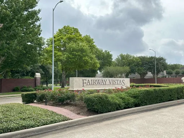 a sign on the side of a road