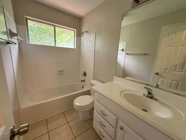 a bathroom with a sink toilet a shower and bathtub