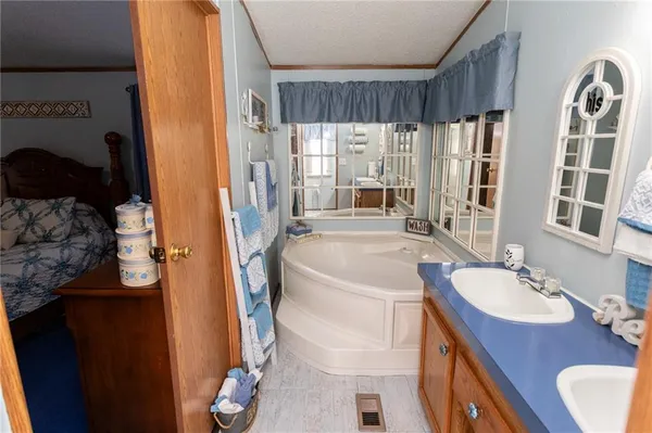 a bathroom with a toilet and a shower curtain