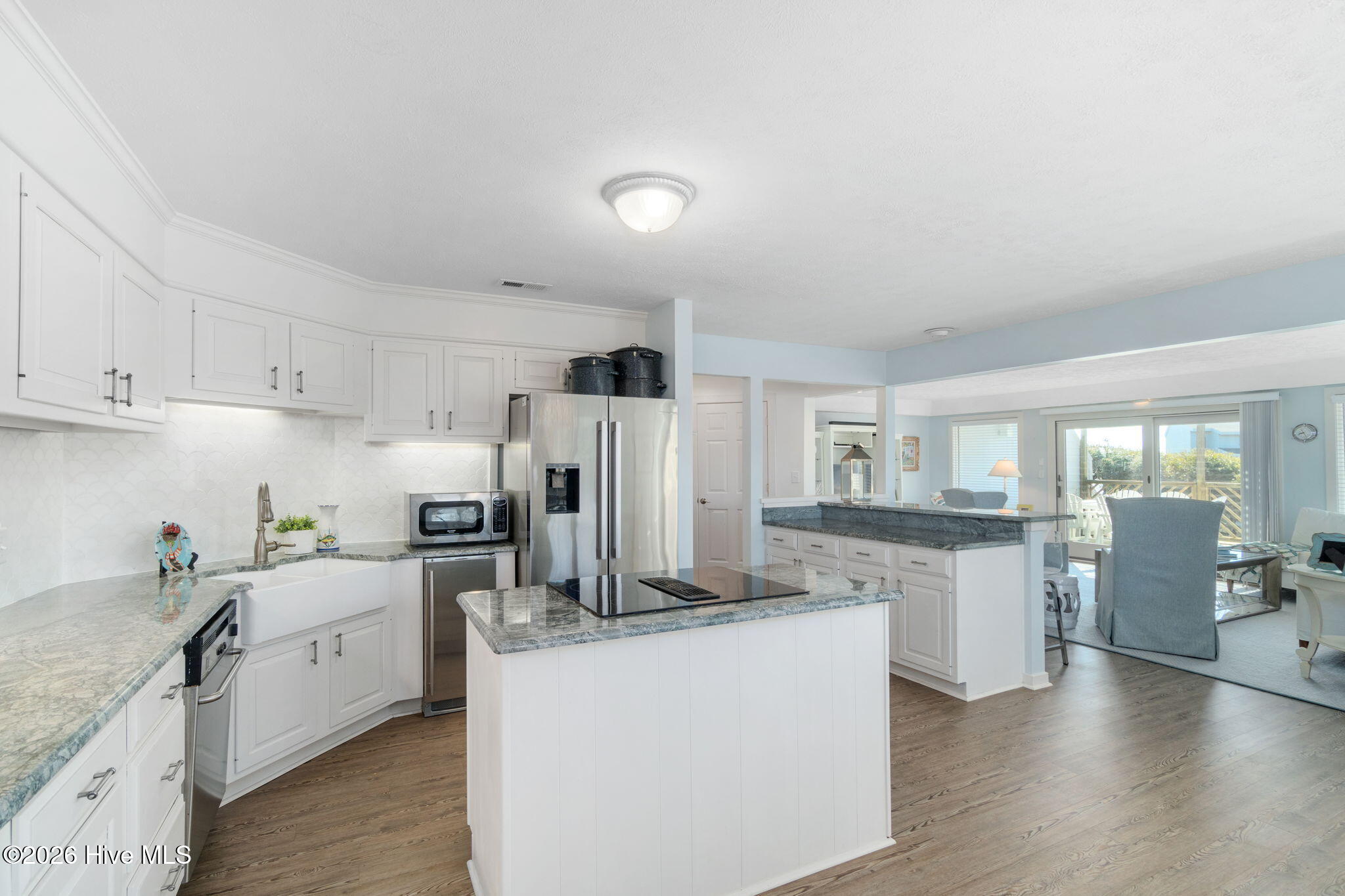 301 Salter Path Road, Unit 2 GENESIS Pine Knoll Shores, NC 28512 - Photo 16 of 54 Kitchen with Island