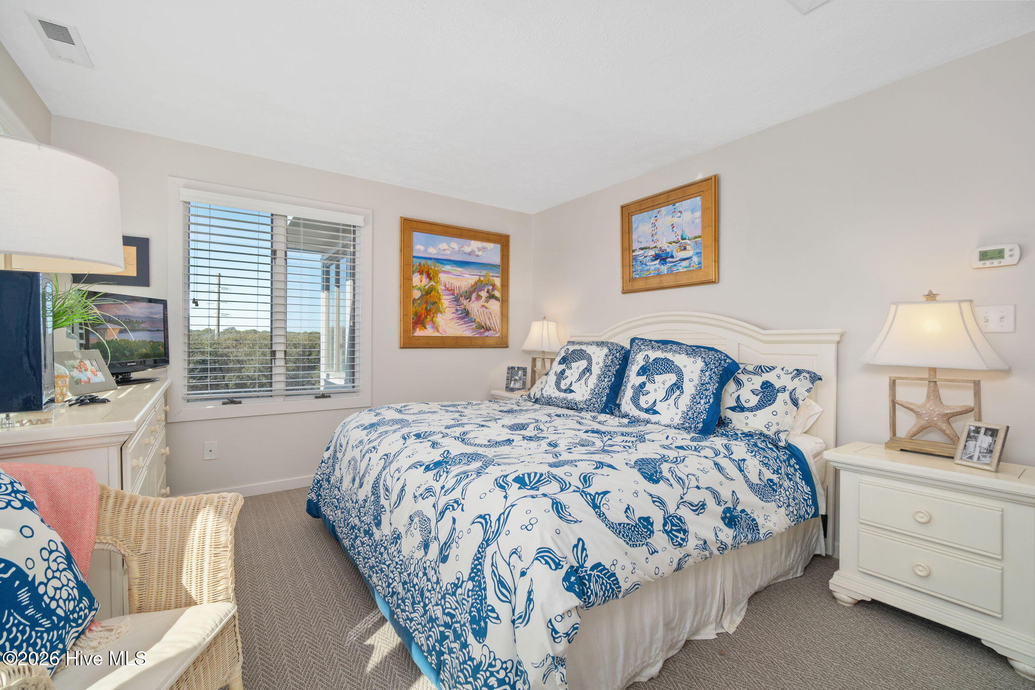 301 Salter Path Road, Unit 2 GENESIS Pine Knoll Shores, NC 28512 - Photo 31 of 54 Primary Bedroom with Deck Access
