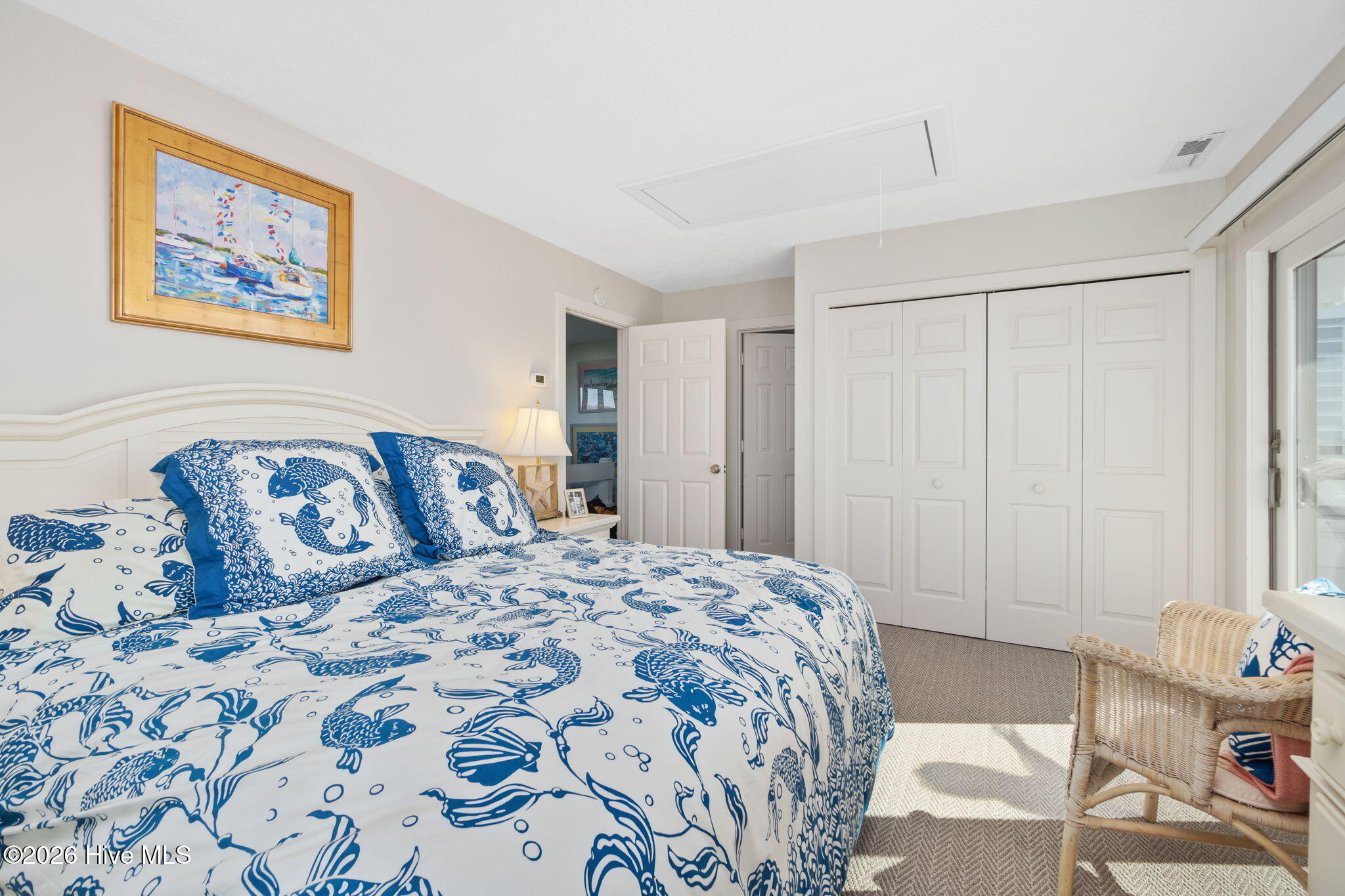 301 Salter Path Road, Unit 2 GENESIS Pine Knoll Shores, NC 28512 - Photo 32 of 54 Primary Bedroom with Deck Access