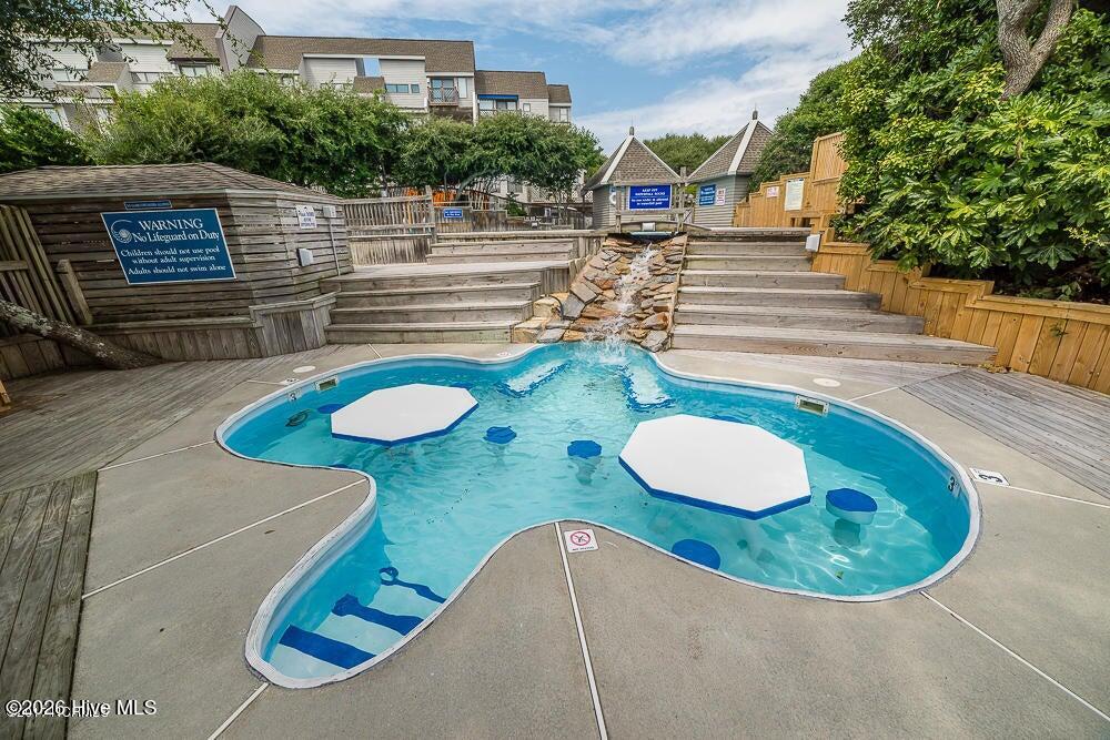 301 Salter Path Road, Unit 2 GENESIS Pine Knoll Shores, NC 28512 - Photo 44 of 54 Adult Pool