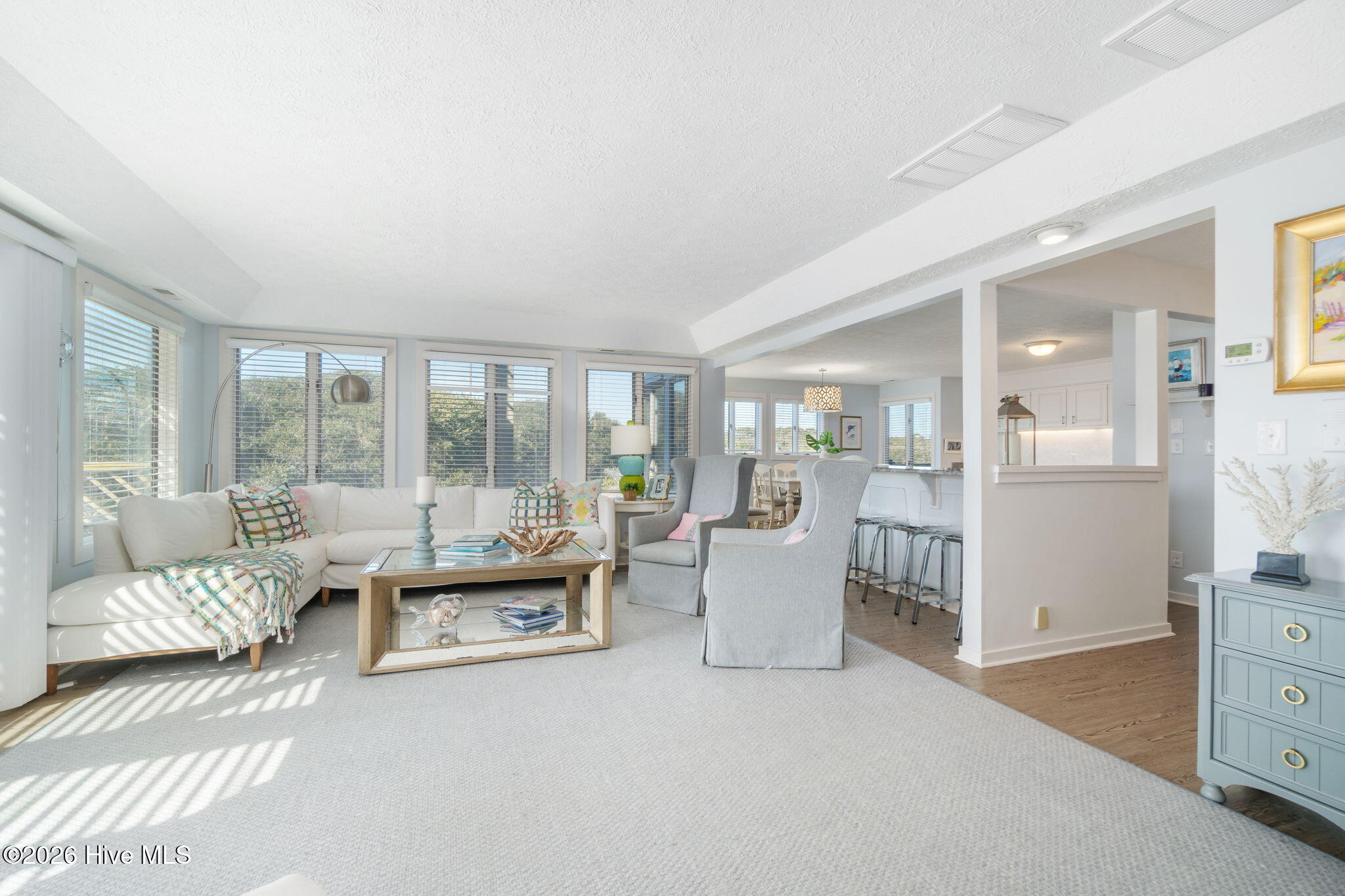 301 Salter Path Road, Unit 2 GENESIS Pine Knoll Shores, NC 28512 - Photo 5 of 54 Living Room Into Kitchen
