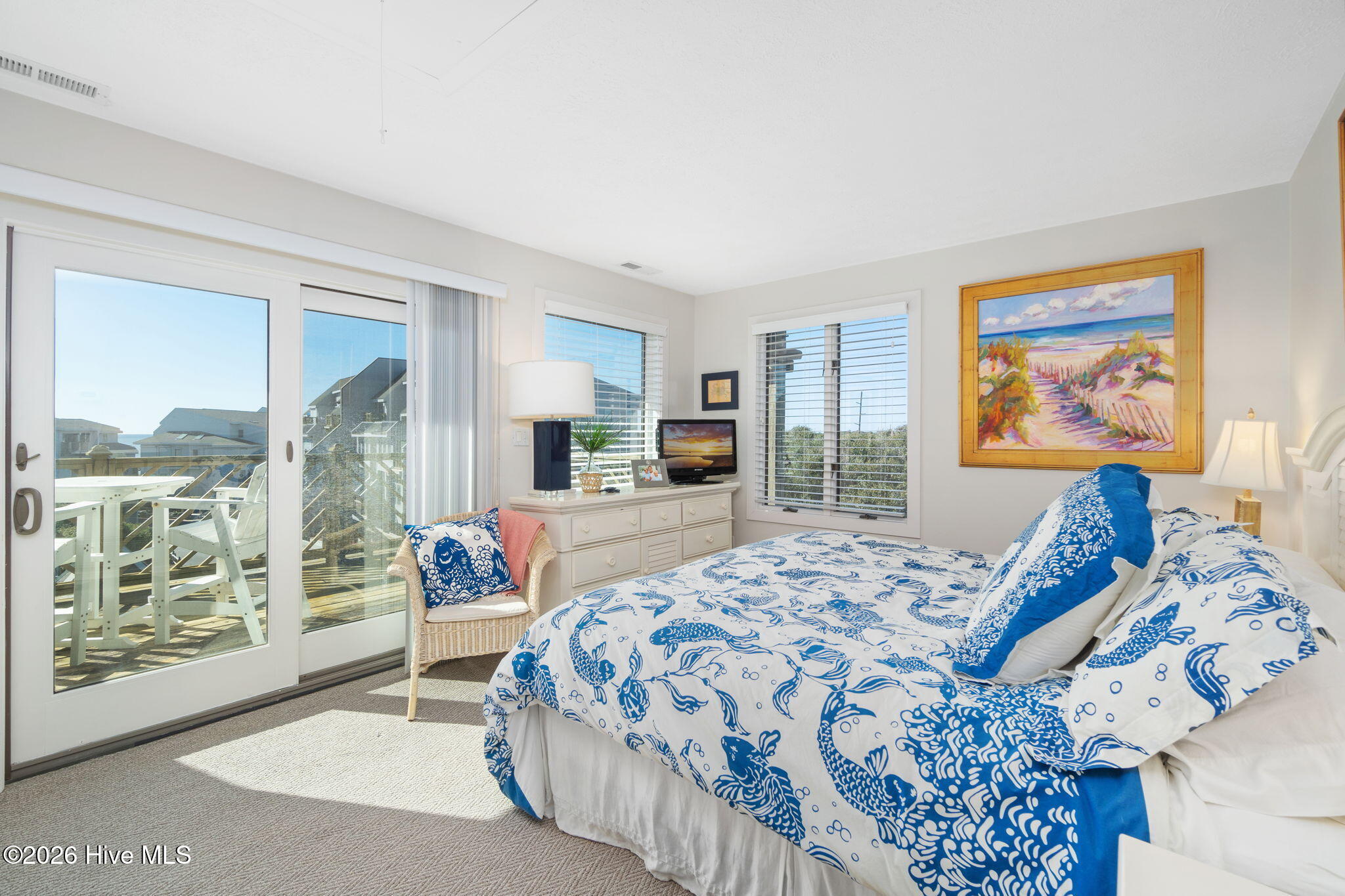 301 Salter Path Road, Unit 2 GENESIS Pine Knoll Shores, NC 28512 - Photo 6 of 54 Primary Bedroom with Deck Access