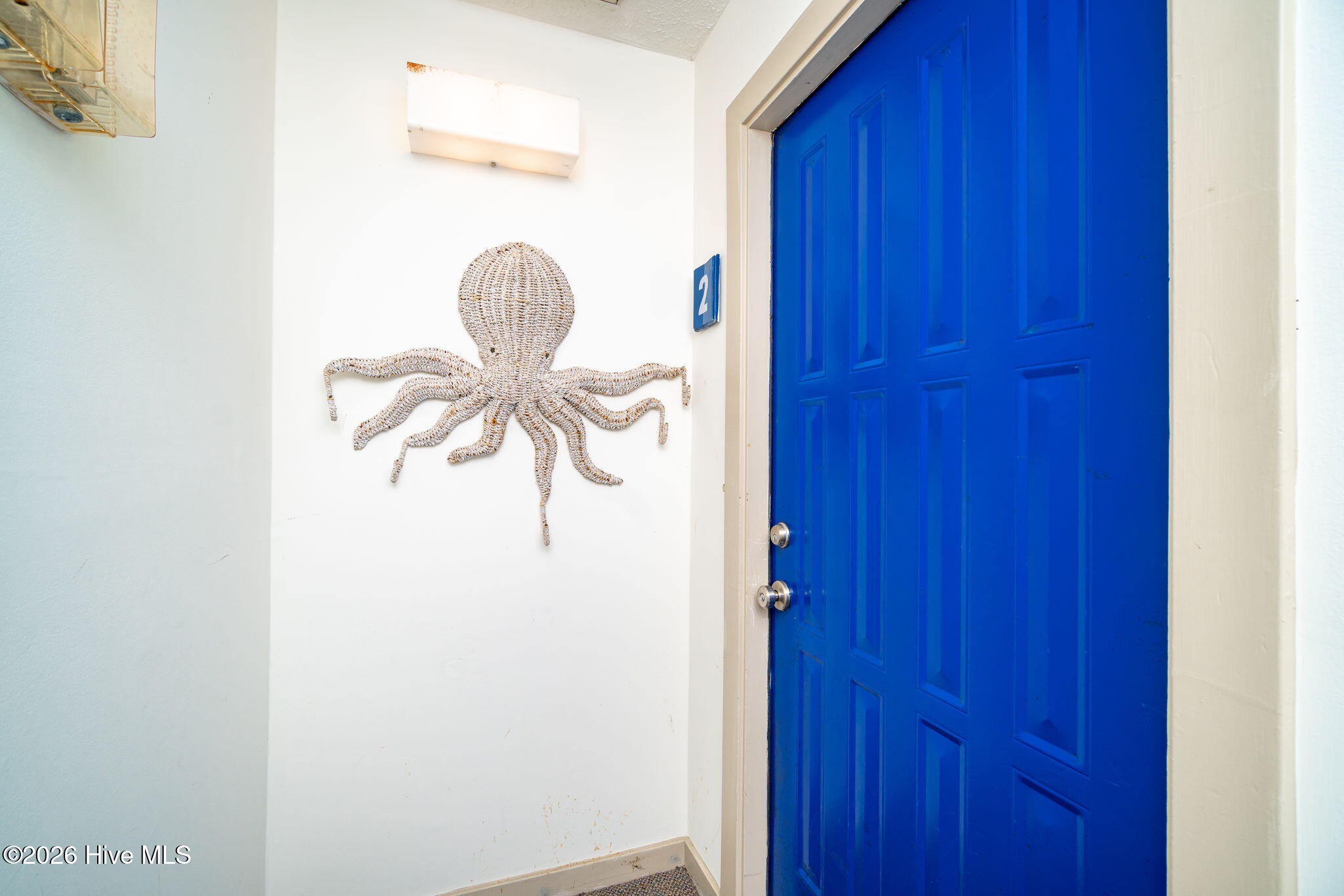 301 Salter Path Road, Unit 2 GENESIS Pine Knoll Shores, NC 28512 - Photo 9 of 54 Front Entrance