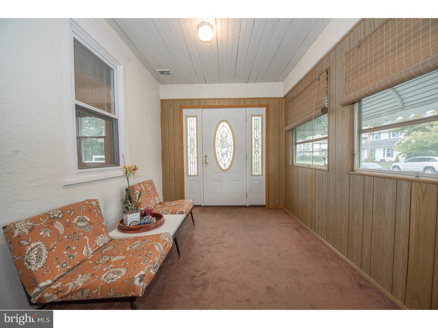 238 Strathmore Road Havertown, PA 19083 - Photo 4 of 25 a view of a livingroom with wooden furniture