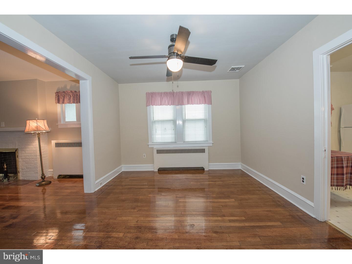 238 Strathmore Road Havertown, PA 19083 - Photo 9 of 25 a view of empty room with wooden floor and fan