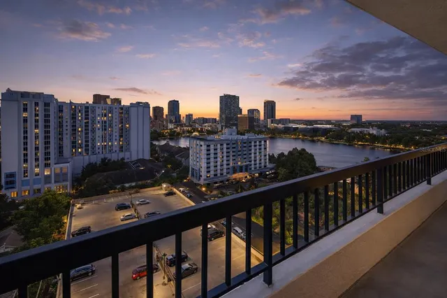 a view of a city skyline from a balcony