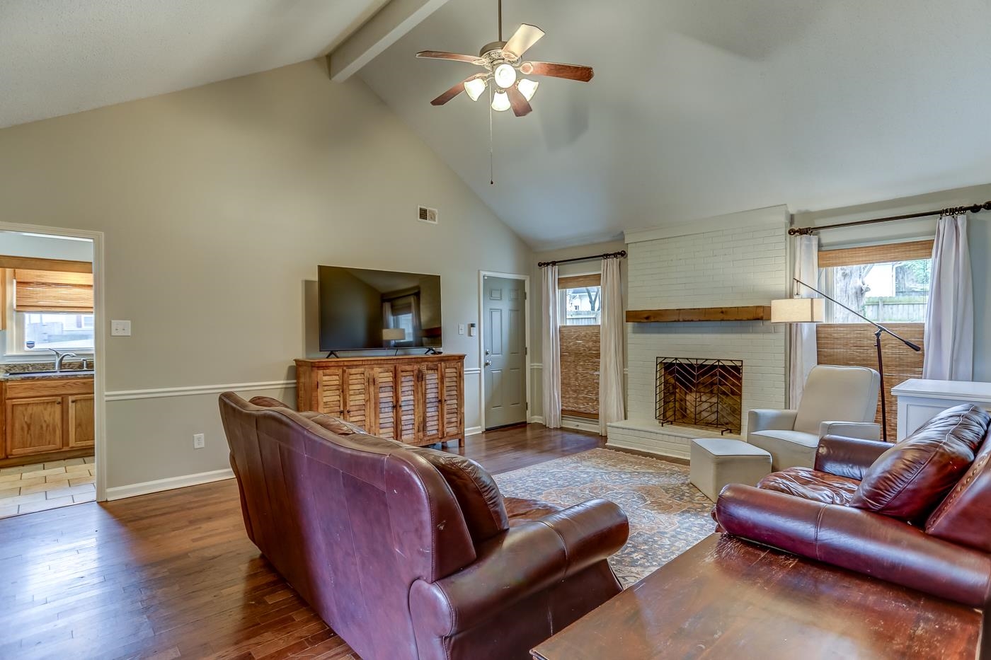 293 Glen Echo Road Collierville, TN 38017 - Photo 2 of 33 a living room with furniture and a fireplace