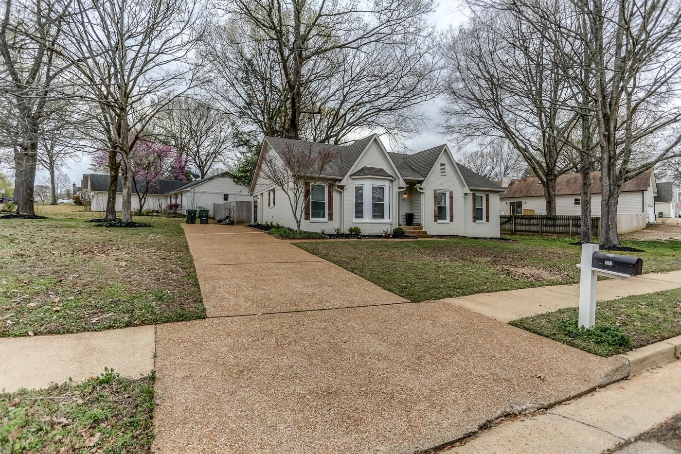 293 Glen Echo Road Collierville, TN 38017 - Photo 30 of 33 front view of a house with a yard