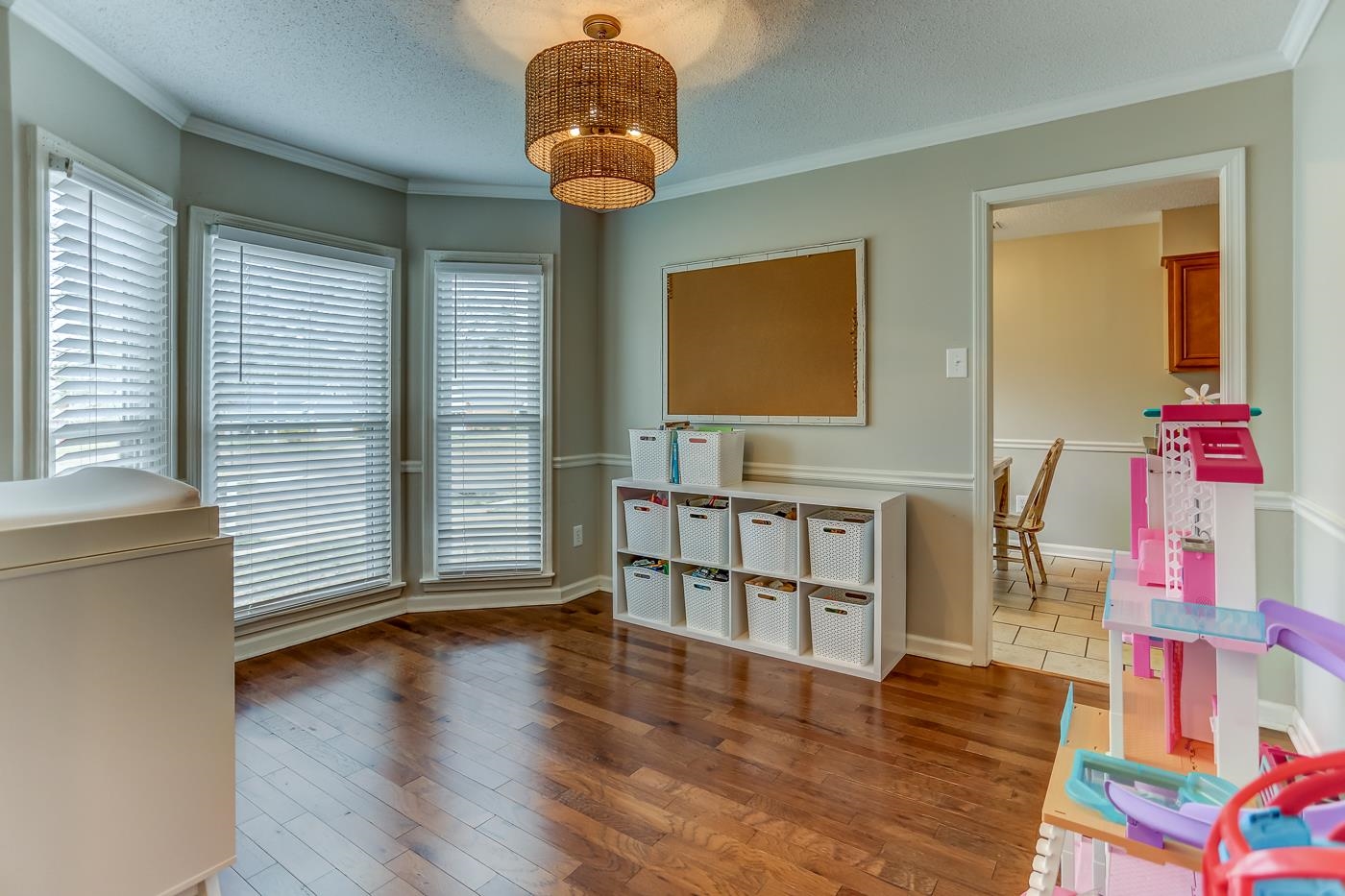 293 Glen Echo Road Collierville, TN 38017 - Photo 3 of 33 a view of livingroom with furniture wooden floor and windows