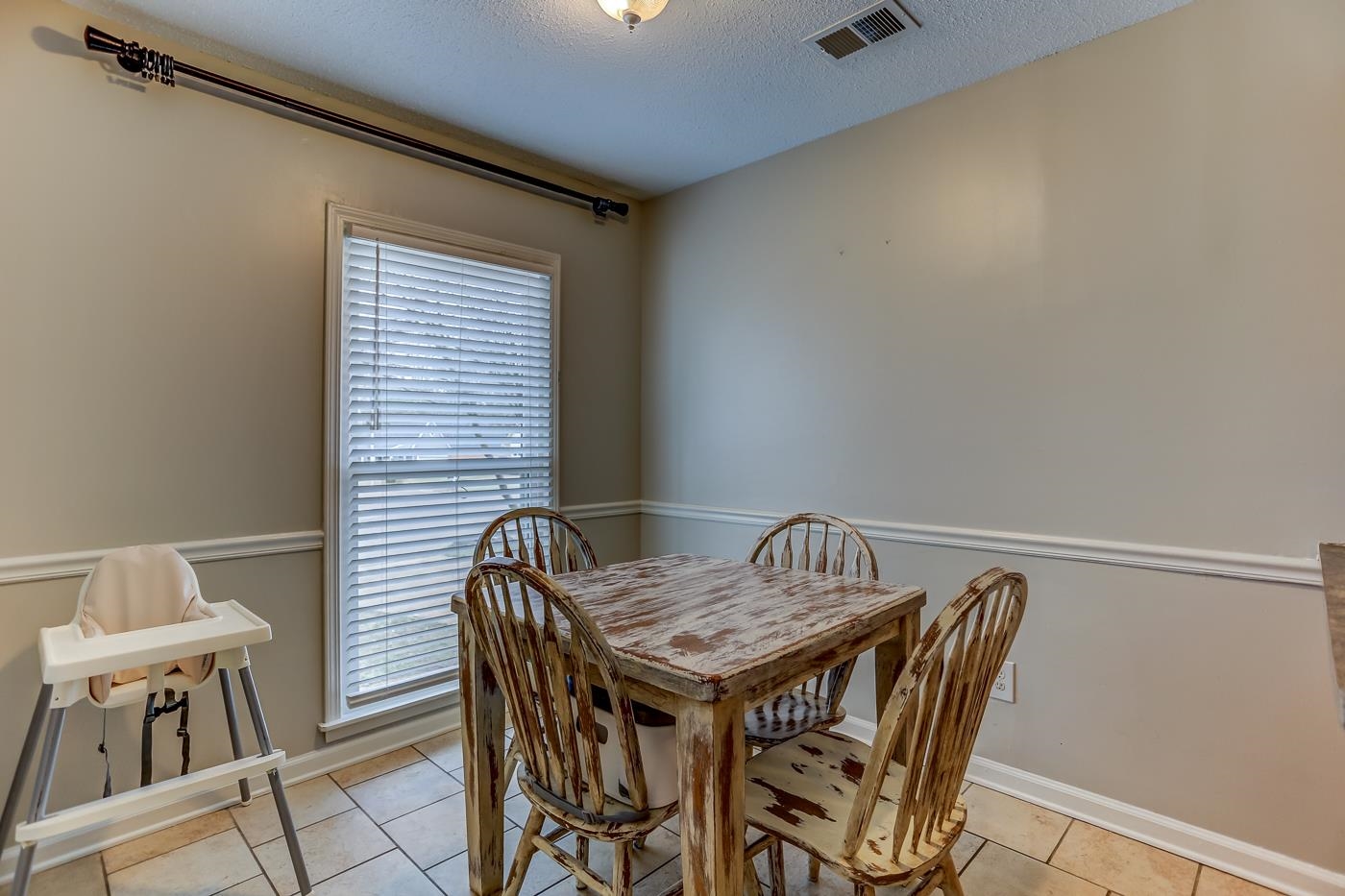 293 Glen Echo Road Collierville, TN 38017 - Photo 10 of 33 a view of a dining room with furniture and wooden floor